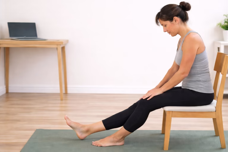 Seated hamstring stretch in office